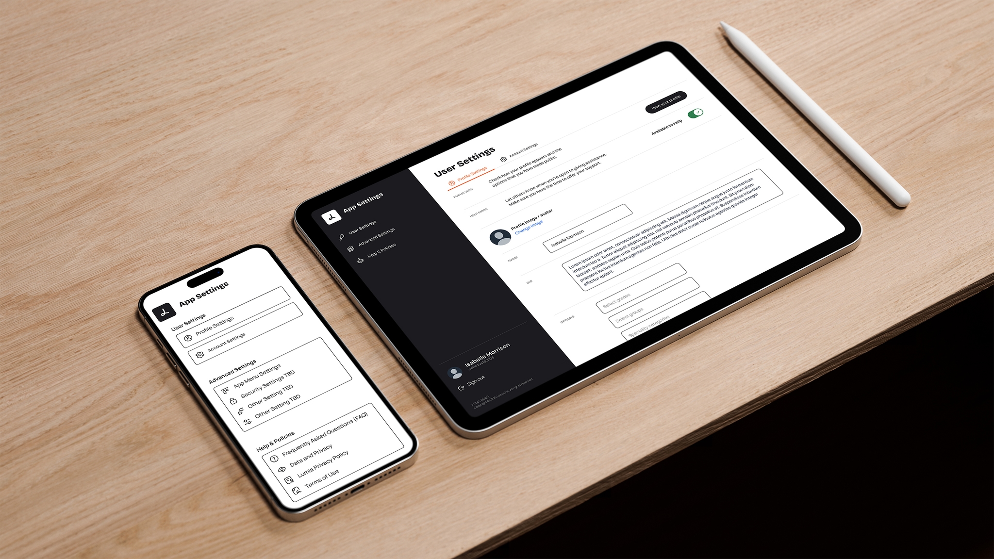 Lumia App settings screens shown on both an ipad and an iphone with both devices sat on a light wooden table.